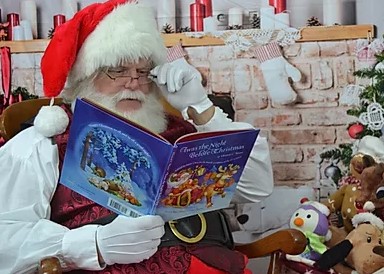 Sugar Land Santa reading a story